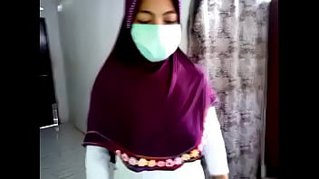 Jilbab Hot Pamer Tubuh Seksi Di Ranjang